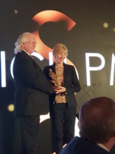 Bev Roberts receiving her LUCA for Tutor of the Year Bev Roberts receiving her LUCA for Tutor of the Year